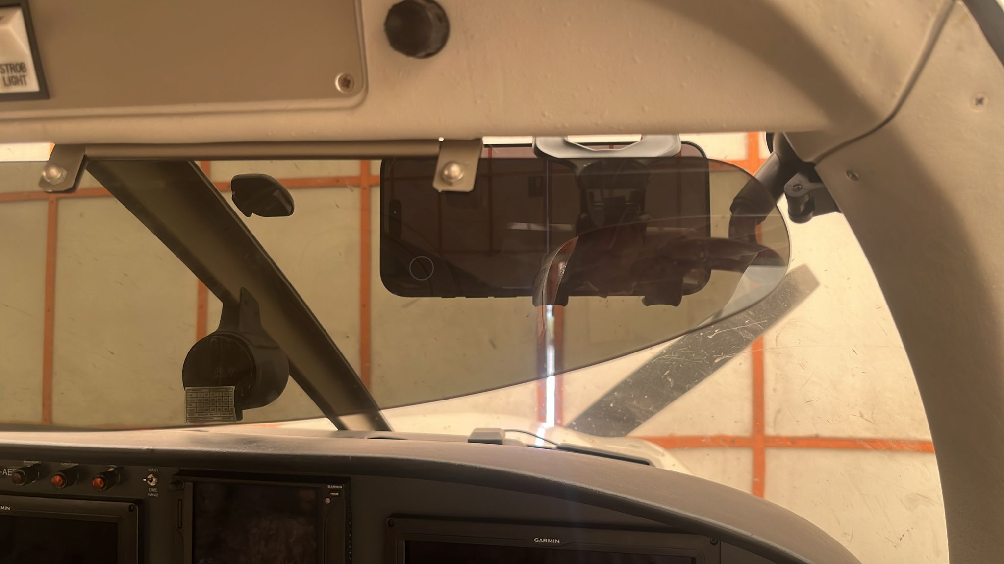 Mobile phone mounted on windshield